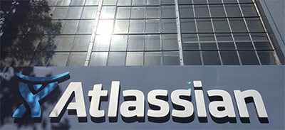 Guys play ping pong at dream company.